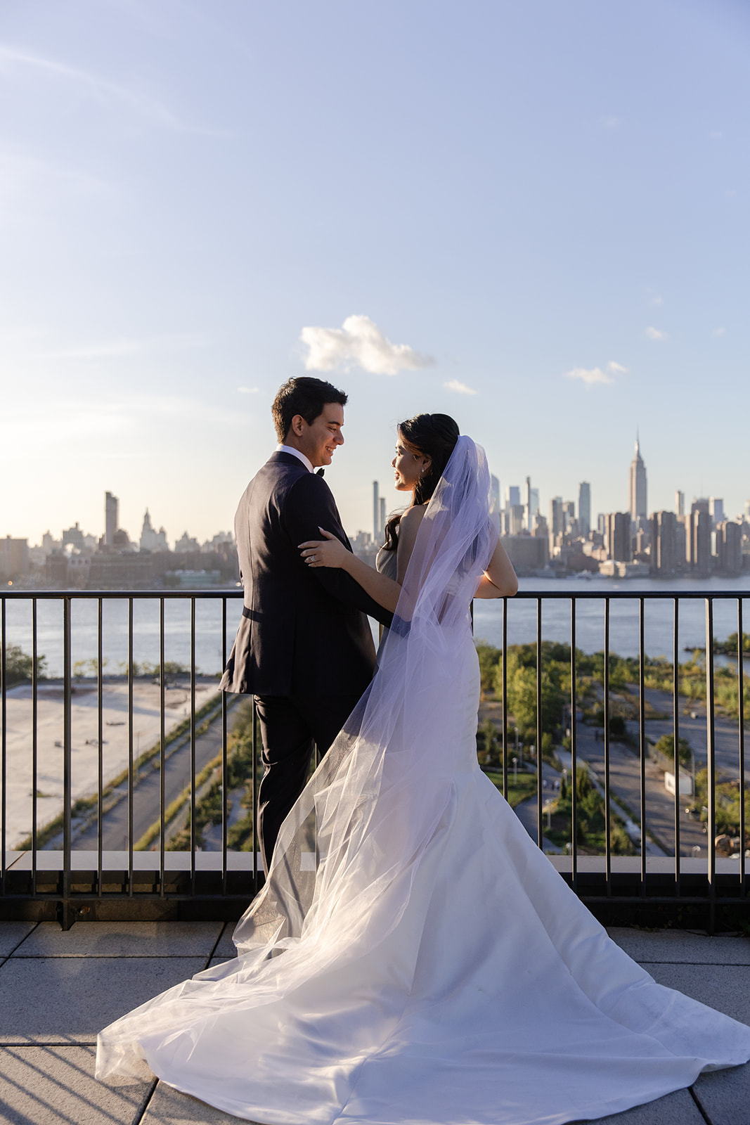 Bride and Groom on Balcony at Wythe Hotel
