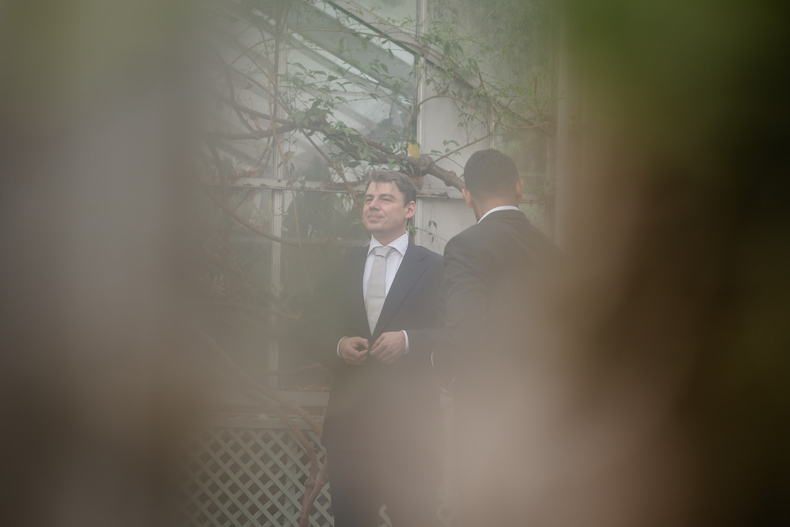 Groom Preparing for First Look at Wave Hill Garden Wedding